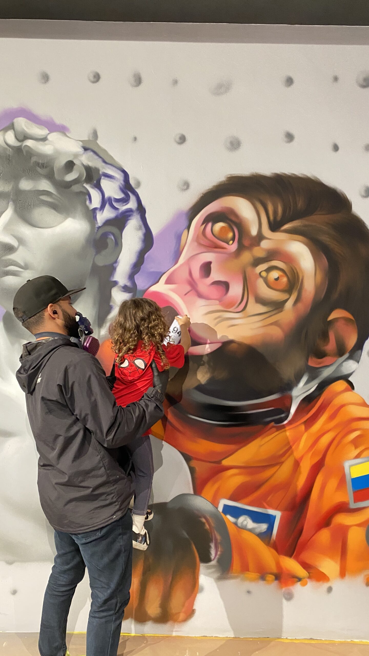 mural arte graffiti padre hija familia